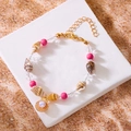 Rosa Ozean Muschel-Armband mit goldenem Muschelanhänger und weißem Perlendetail - Rosa Perle Muschel Armband