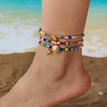 Bohemian multilayer starfish and shell beaded anklet set worn on a sunny beach - Three-Piece Set / Multicolor Conch Starfish Style (AK25Y0050-4)