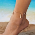 Bohemian gold starfish and shell beaded anklet with pearls on a beach background - Gold Chain Starfish Pearl Shell (AK25Y0059)