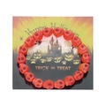 Detalle de pulsera de cuentas de calavera naranja para Halloween en tarjeta decorativa - Pulsera Calavera Roja