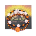 Detalle de pulseras de Halloween con cuentas, calaveras y calabaza en tarjeta base - Set de Pulseras Calabaza Calavera Negro y Naranja