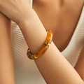 Bohemian amber resin bamboo bracelet with golden metal spacers for a vintage look - Amber Marble (AB0008-3)
