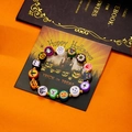 Detalle de la pulsera de Halloween hecha a mano con cuentas de calabaza y fantasma - Estilo Divertido De Calabaza Y Fantasma De Halloween (BR25Y0382-1)