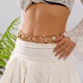 Golden beach waist chain with starfish and shell pendants on a model's waist - Rhinestone Starfish Pearl Shell Style (BJ26Y0033)