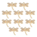 Close-up of 10-piece gold plated dragonfly pendants with sparkling crystal rhinestones - Dragonfly Style (px1106-1)