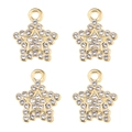 Vue macro de quatre pendentifs en forme d'étoile dorée avec des strass blancs étincelants - Style Étoile à Cinq Branches Ligne Creuse Strass Doré (px1086-27)