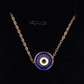 Golden chain necklace featuring a blue evil eye pendant with radial eyelash details - Sapphire Blue