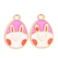 Detail of colorful cartoon Easter egg pendants with pink enamel and golden finish - Pink White Orange Face Style (px1180-5)