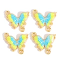 Vue détaillée de quatre breloques papillon dégradées pour la création de bijoux DIY - Dégradé Bleu et Jaune Cadre Doré (px1172-2)