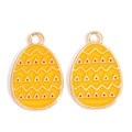 Macro detail of yellow enamel Easter egg charms with zigzag patterns for DIY jewelry - Yellow with White Wave Style (px1180-9)