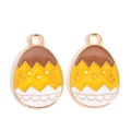 Detail of Easter egg pendants with gold trim and cartoon enamel drip oil patterns - Yellow and White Face Style (px1180-11)