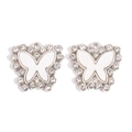 Close-up of silver-tone alloy butterfly pendants with white enamel and sparkling rhinestones - Silver Base White Style (px1183-10)