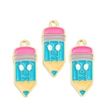 Detailed view of three cute cartoon pencil alloy charms with smiling faces for DIY jewelry - Blue Cartoon Face Pencil (px1227-14)