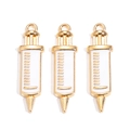 Gros plan détaillé de trois breloques seringues médicales dorées avec émail blanc pour bijoux - Seringue (px1216-5)