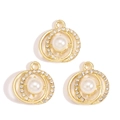 Detailed view of three gold alloy pendants with white pearls and micro-zirconia insets - Pearl Double Ring Style (px1229-7)