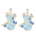 Detail of blue violin charms with floral patterns for jewelry making DIY accessories - Blue Cello