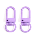 Close-up of purple swivel lobster clasps for DIY bag accessories and keychains - Purple