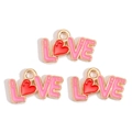 Close-up of enamel LOVE charms with red hearts and pink finish for DIY jewelry crafting - Pink LOVE Letter Style (px1244-4)