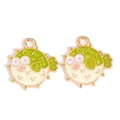 Detailed macro view of two green pufferfish enamel charms with golden metal edges - Green White Puffer Fish Style (px1242-3)
