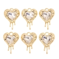 Détail de six pendentifs cœur dorés avec cristaux clairs et effet de métal fondu fluide - Cœur Fluide Transparent (px1311-6)