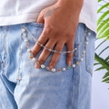 Layered hip hop pant chain with pearls, colorful crystals, and cross pendant on denim - Silver Cross Flower Style