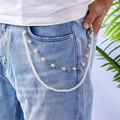 Double-layer pearl and clover metal trouser chain accessory styled on blue denim jeans - Silver Clover Pearl Chain