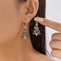 Detail of Christmas tree earrings with colorful rhinestones worn by a fashion model - Colorful Rhinestone Christmas Tree Stud Earrings (ER25Y0387)