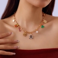 Collana di Natale con ciondoli in smalto colorato come l'omino di pan di zenzero - Collana Omino di pan di zenzero