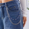 Détail de la chaîne de taille double épaisseur avec cristaux bleus et maillons argentés - Boule de Cristal Strass