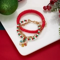 Detailed view of Christmas layered bracelet set with snowflake charms and festive beads - Red Snowflake Style