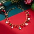 Detailed view of Christmas charm bracelet with Santa, tree, and reindeer pendants - Christmas Tree Santa Elk Style / Gold