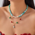 Detail of double-layer Christmas necklace with MERRY letter beads and festive charms - Double Layer Multicolor Soft Clay MERRY Tree Style