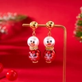 Christmas snowman drop earrings with red snowflake pattern and rhinestone neck detail - Red Snowman