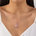 Close-up of pink crystal Christmas tree pendant on a rose gold necklace on a model - Pink Christmas Tree Pendant Necklace (#NC25Y0829) / Rose Gold