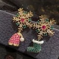 Detail of asymmetric Christmas earrings with colorful zircons and snowflake design - Asymmetrical Hat and Boot Style (ER24Y0618)