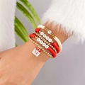Vierteiliges Set mit Herz-Armbändern und LOVE-Anhängern für den Valentinstag - 4-teiliges Valentinstag Kalender Stil (BR25Y0733-7)