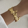 Goldene Armspange mit strukturierten Schleifen-Designs im Vintage-Stil für den Strand - Plissierte Schleife (BR25Y0782)