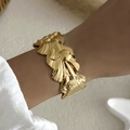 Gold-plated wide open cuff bracelet with embossed vintage floral patterns on wrist - Shell Flower Texture (BR25Y0788)