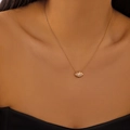 Elegant gold layered necklace featuring a marquise-cut zircon pendant on model - Oval Style (Gold Color)
