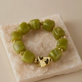 Detail of olive green resin beads with golden irregular metal piece on elastic bracelet - Random Texture/Shade / Olive Green Sand (AB0075-11)