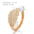 Detailed view of gold leaf bracelet with white crystals and large 1.5cm pearl charm - Gold Hollow Leaf Pearl Style (SZ60312)