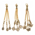 Detailed view of alloy prayer bead pendants with golden tassel chains and coin charms - Teardrop Coin and Butterfly Style (PX24)