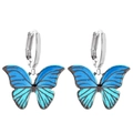 Orecchini a farfalla in argento con ali sfumate blu su sfondo bianco minimalista - Stile Sfumato Blu