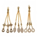 Detailed view of alloy prayer bead tassel pendants with vintage gold finish and engravings - Star Moon and Floral Style (PX8)