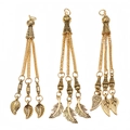 Close-up of vintage gold alloy prayer bead tassels with leaf-shaped metal charms - Leaf Vein and Feather Style (PX7)
