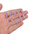Hand holding ten purple enamel lightning bolt charms for DIY jewelry making - Purple
