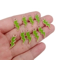 DIY jewelry making kit featuring ten green enamel lightning bolt charms with gold edges - Green