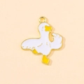 Macro detail of funny enamel duck charm with middle finger gesture for DIY jewelry making - Duck