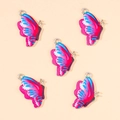 Détail de pendentifs papillons colorés avec anneaux métalliques pour bijoux faits main - Rouge Rose