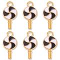 Macro detail of black and white enamel lollipop charms with gold metal edges for DIY jewelry - Black